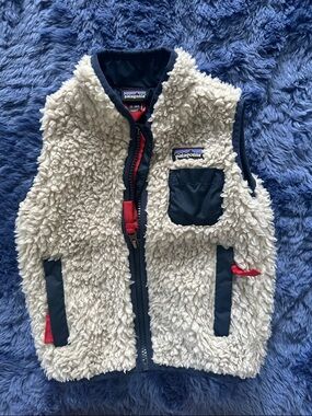 Patagonia Cream Sherpa Vest with Navy Accents and Red Zipper Tabs